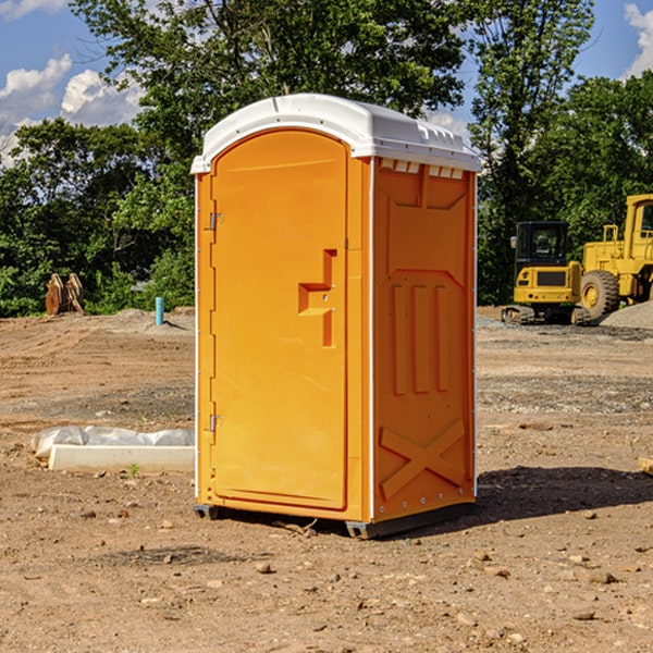 how often are the porta potties cleaned and serviced during a rental period in Hext